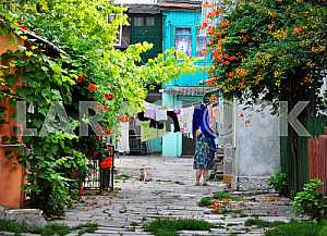 A woman hangs clothes