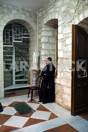 Franciscan monk in the Church of Jesus' first miracle, Cana, Israel
