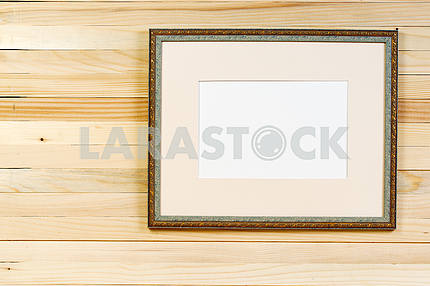 Frame on wooden wall. Interior Design. Copy space