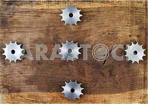 Different construction tools on a wooden background - screwdriver, caliper.