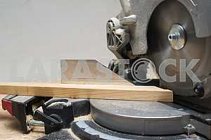 Carpenter tools on wooden table with sawdust. Circular Saw.