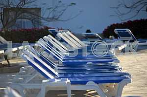 Swimming pool with sun beds at the hotel
