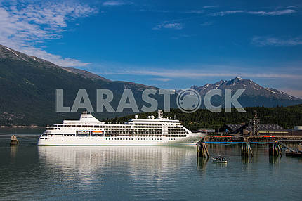 Cruise ship on the background of mountains
