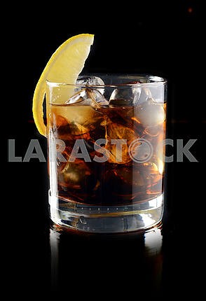 Cocktail with ice cola whiskey