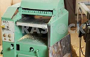 Carpenter tools on wooden table with sawdust. Circular Saw. Carpenter workplace top view
