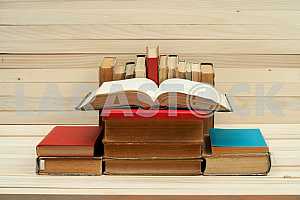 Stack of hardback books isolated on white background. Back to school. Copy space