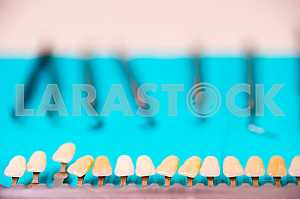 Stomatological instrument in the dentists clinic. Operation, tooth replacement.