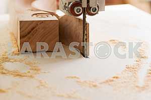 Carpenter tools on wooden table with sawdust. Circular Saw. Carpenter workplace top view