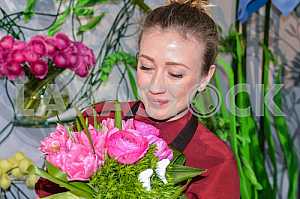 Girl with a bouquet of flowers