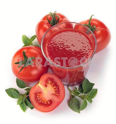 glass of tomato juice and fruits