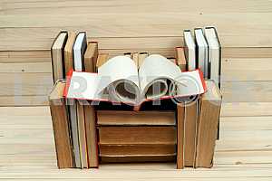 Stack of hardback books isolated on white background. Back to school. Copy space