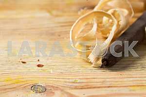 Carpenter tools on wooden table with sawdust. Circular Saw.