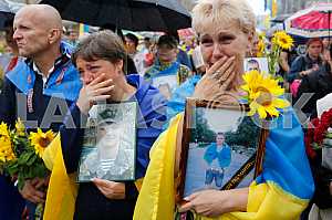 Ukraine: Relatives March to Honor Dead
