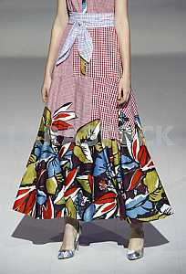 Detail of colorful dresses during a demonstration model outfit by Ukrainian designer Olena Serebrova