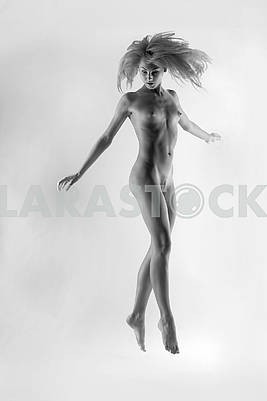 naked blonde in a jump .