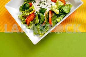 Fresh vegetable salad with sour cream