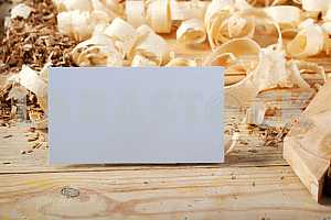 Carpenter tools on wooden table with sawdust. Circular Saw.