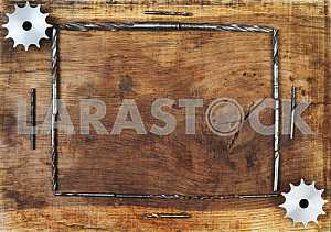 Different construction tools on a wooden background - screwdriver, caliper.